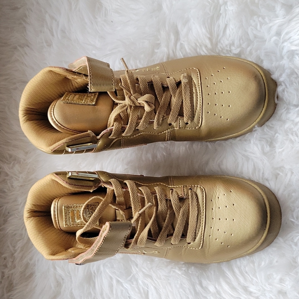 Gold fila hi tops